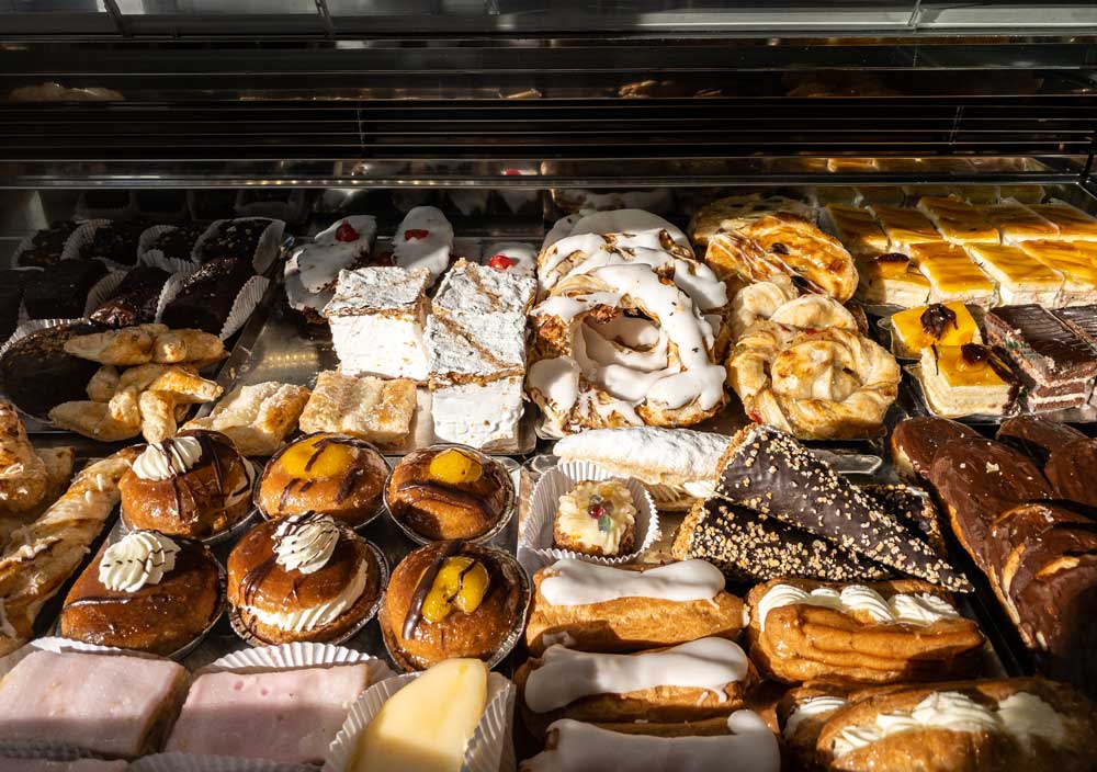 Breakfast,of,spanish,biscuits,,sweet,pastries,,puff,pastry,,powdered,sugar